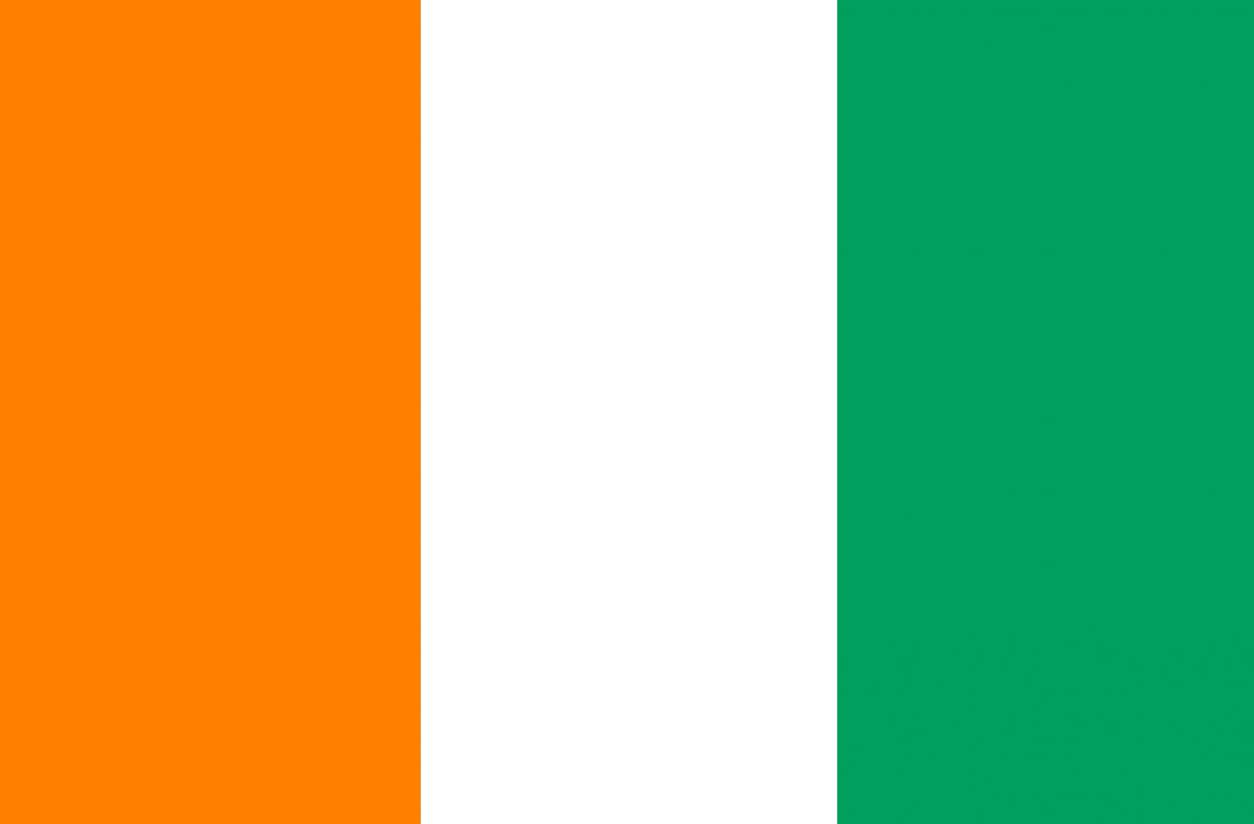 Cote d'Ivoire flag on fabric surface. Ivory Coast national flag. Republic of Burkina Faso. African country