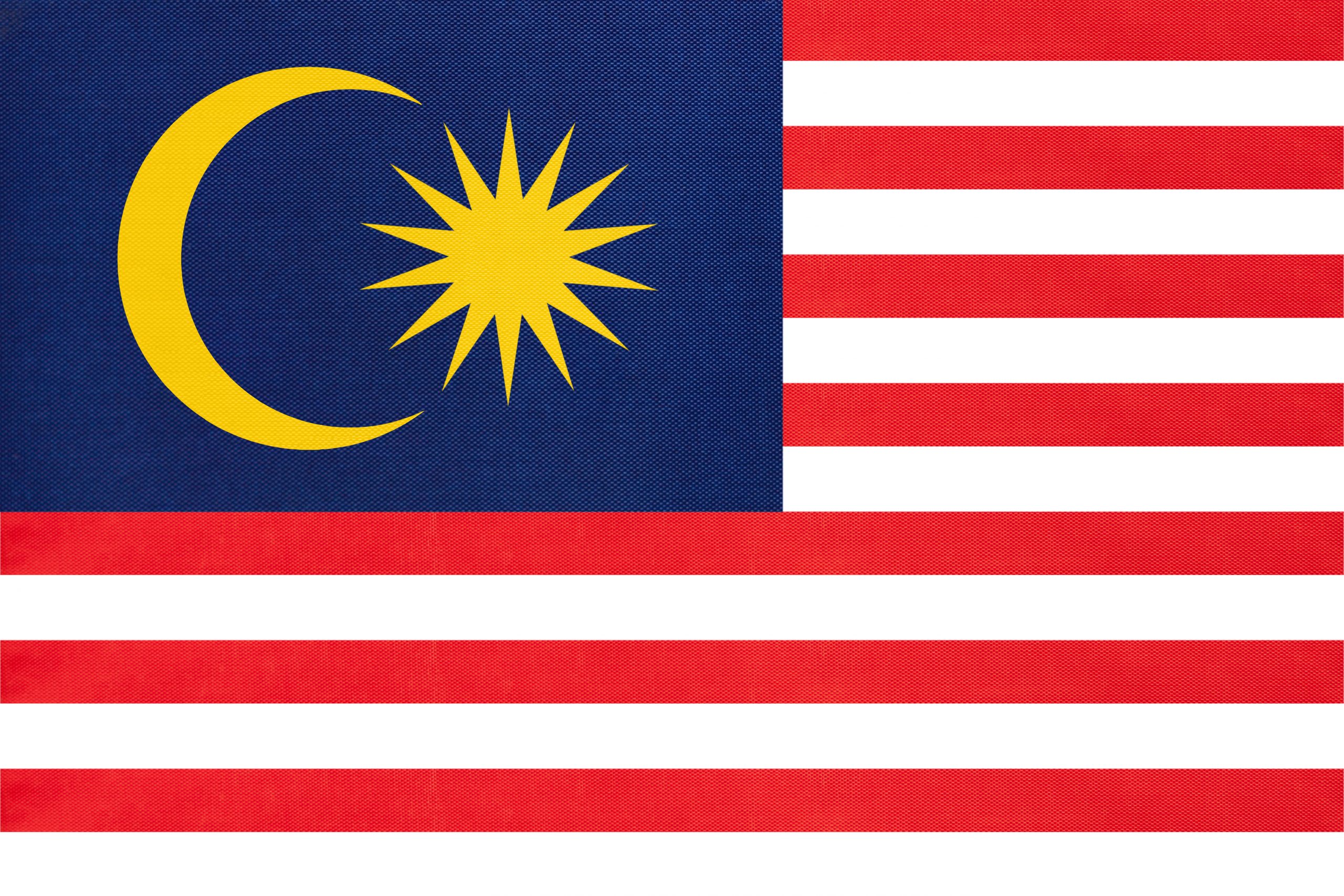 Malaysia national fabric flag textile background. Symbol of international world Asian country. State official Malaysian sign.